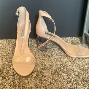 Nude clear-strapped heels